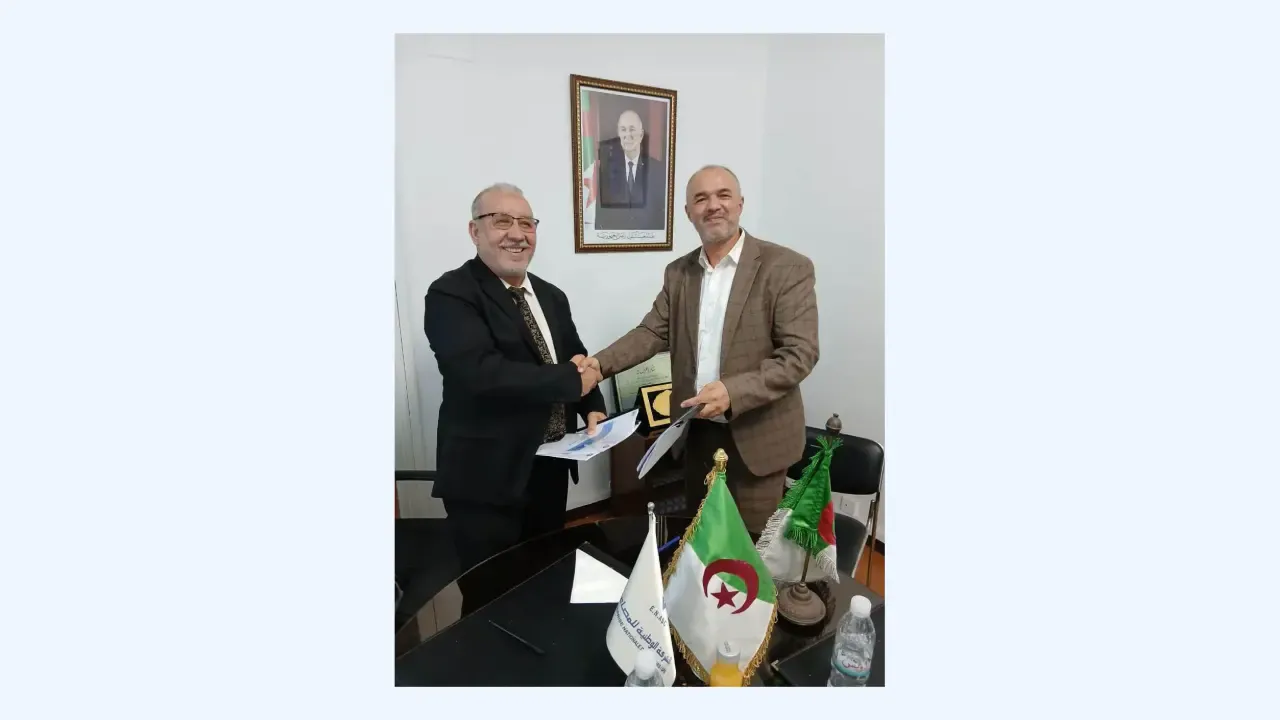 Agreement between the National Company for Metal and Copper Structures and the National Elevator Company