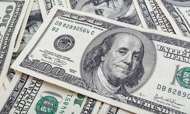 Dollar Rises After Interest Rate Hold